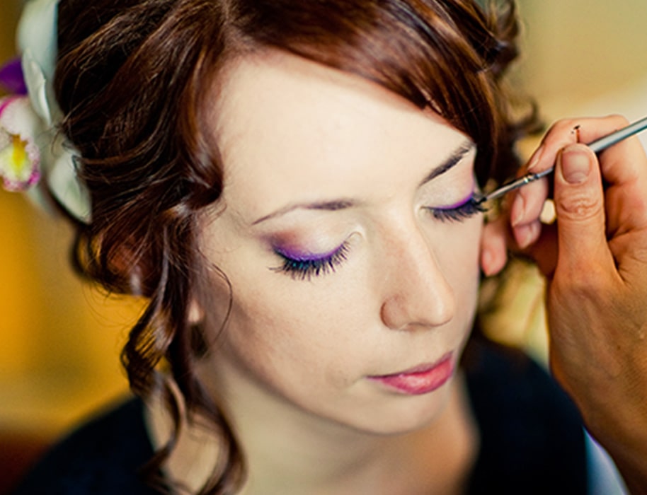 Makeup application on woman, Viasun cosmetics theme.