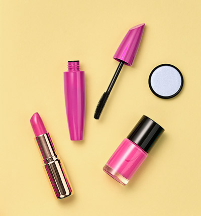 Viasun cosmetics featuring lipstick, mascara, nail polish, and eyeshadow.